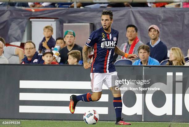 New England Revolution midfielder Diego Fagundez carries the ball down the wing. The New England Revolution defeated the Colorado Rapids 2-0 in a...