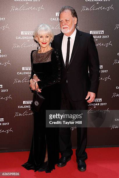Helen Mirren and Taylor Hackford attend the 2016 Pirelli Calendar unveiling gala at La Cite Du Cinema on November 29, 2016 in Saint-Denis, France.