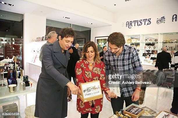 Jamie Hince, Susan Blachley of Morrison Hotel Gallery, and Roberto Aguire attend Artists With Animals at Ron Robinson on November 29, 2016 in Santa...