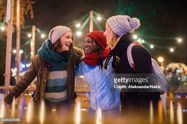 having fun on christmas market - ice rink stock pictures, royalty-free photos & images