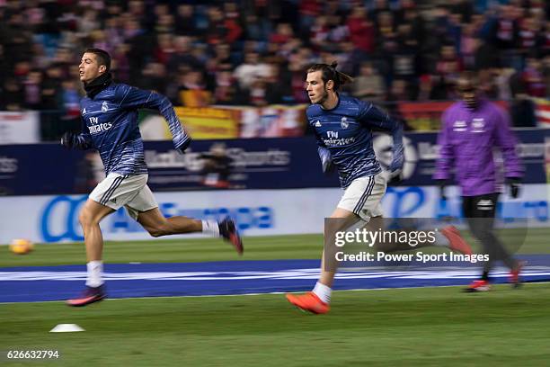 Cristiano Ronaldo and Gareth Bale of Real Madrid in training prior to their La Liga match between Atletico de Madrid and Real Madrid at the Vicente...