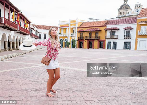 excited female tourist in cartagena - cartagena stock pictures, royalty-free photos & images