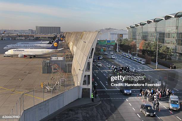 Lufthansa ground crews protest against a gathering of striking Lufthansa pilots who had gathered outside Lufthansa headquarters at Frankfurt Airport...
