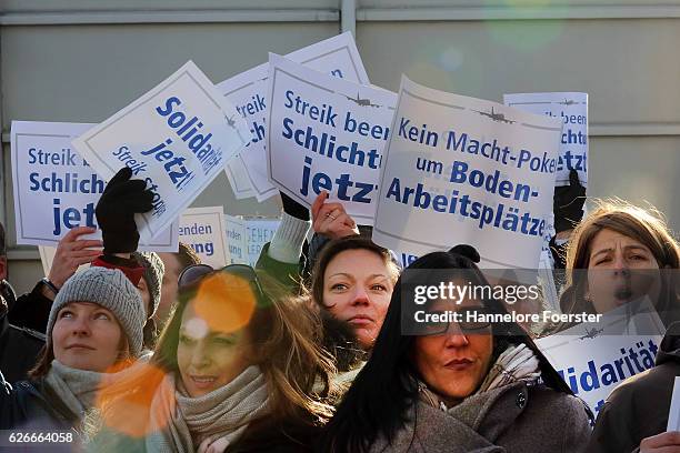 Lufthansa ground crews protest against a gathering of striking Lufthansa pilots who had gathered outside Lufthansa headquarters at Frankfurt Airport...