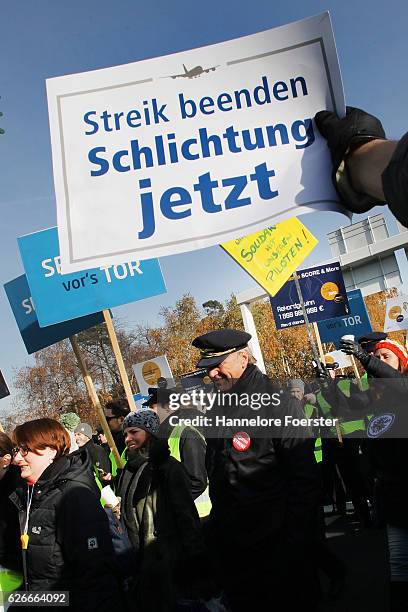 Lufthansa ground crews protest against a gathering of striking Lufthansa pilots who had gathered outside Lufthansa headquarters at Frankfurt Airport...