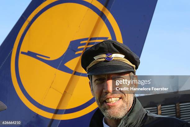 Striking Lufthansa pilots gather outside Lufthansa headquarters at Frankfurt Airport on November 30, 2016 in Frankfurt, Germany. Today's strike,...