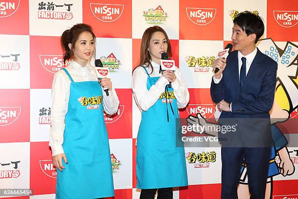 Gillian Chung and Charlene Choi of Twins attend a commercial activity of Nissin foods on November 30, 2016 in Hong Kong, China.