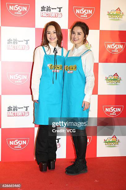Gillian Chung and Charlene Choi of Twins attend a commercial activity of Nissin foods on November 30, 2016 in Hong Kong, China.