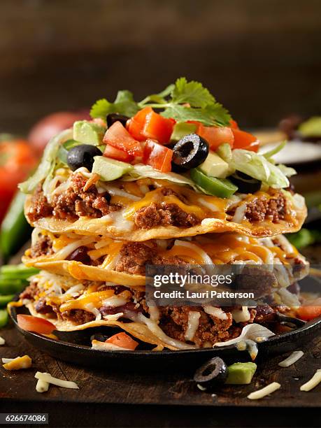 chilli cheese tostada tower - tostada stock pictures, royalty-free photos & images