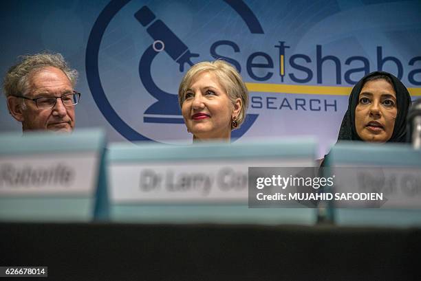 Doctor Larry Corey, Glenda Gray, president of the country's Medical Research Council and Khatija Ahmed, Executive director of the Setshaba Research...