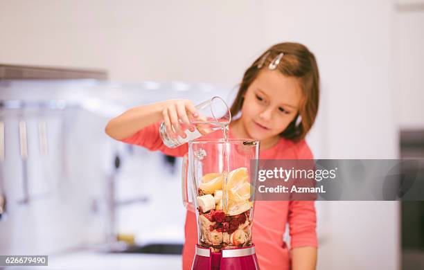 finishing smoothie - liquidiser stock pictures, royalty-free photos & images