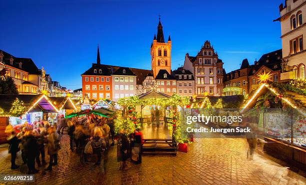 trier - main square and christmas market - moselle stock pictures, royalty-free photos & images