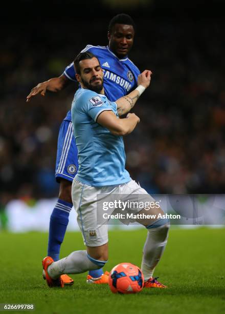 Mikel John Obi of Chelsea and Alvaro Negredo of Manchester City