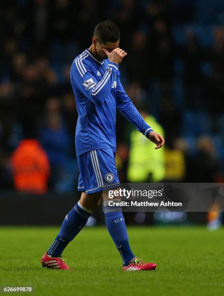 Dejected Fernando Torres of Chelsea walks off after getting knocked out of the FA Cup