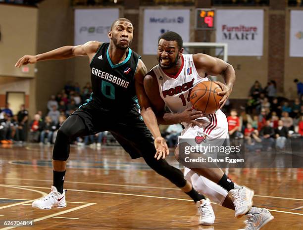 Marcus Posley of the Sioux Falls Skyforce drives against Rasheed Sulaimon from the Greensboro Swarm at the Sanford Pentagon November 29, 2016 in...