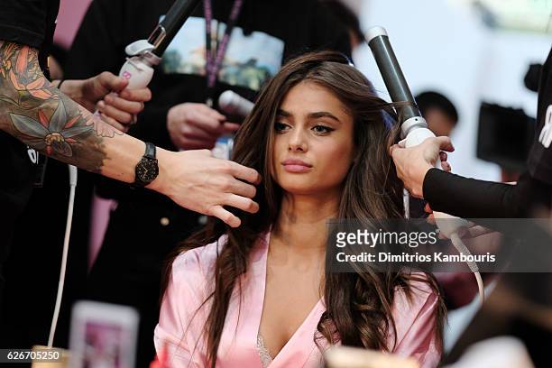 Taylor Hill has her Hair & Makeup done prior the 2016 Victoria's Secret Fashion Show on November 30, 2016 in Paris, France.