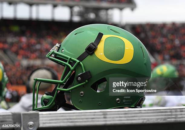 An Oregon helmet sits on an equipment box during the 120th Civil War NCAA football game between the Oregon Ducks and the Oregon State Beavers on...