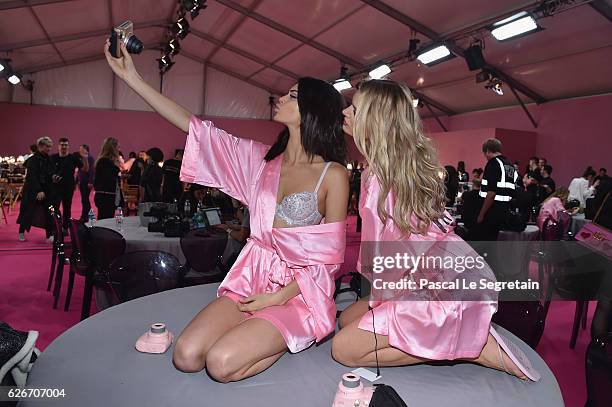 Kendall Jenner and Lily Donaldson pose backstage prior to the Victoria's Secret Fashion Show on November 30, 2016 in Paris, France.