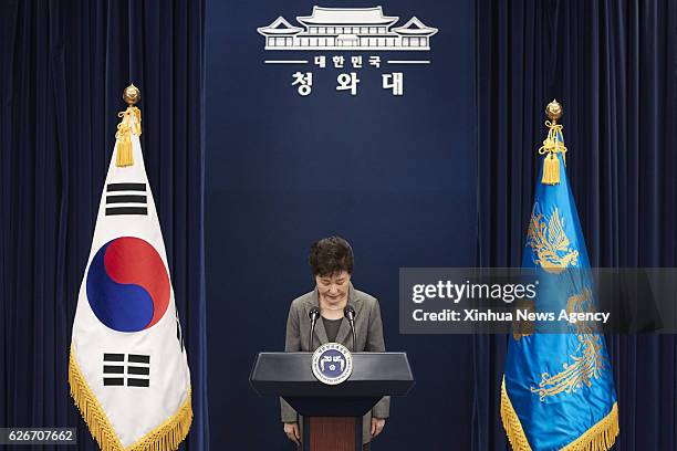 Nov. 30, 2016 -- South Korean President Park Geun-hye bows during her speech to the nation at the presidential Blue House in Seoul, South Korea, Nov....