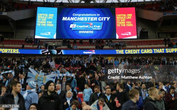 Manchester City fans celebrate winning the Capital One Cup Final