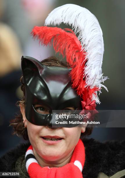 Sunderland fan wearing a black cat mask