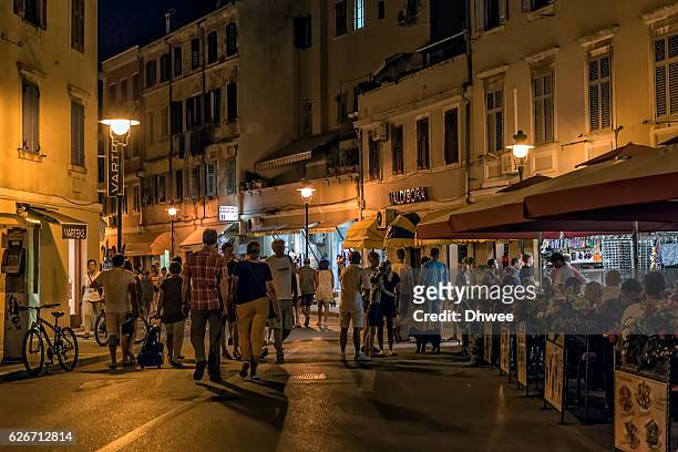 night scene in rovinj old town, croatia - rovinj stock pictures, royalty-free photos & images