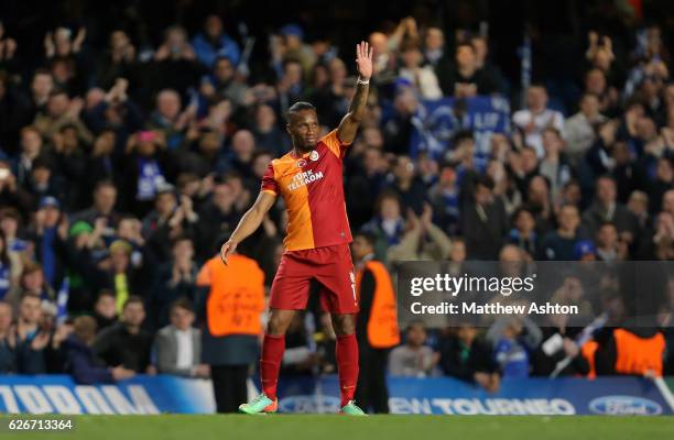 Didier Drogba of Galatasaray waves goodbye to the Chelsea fans as he leaves the pitch at full time