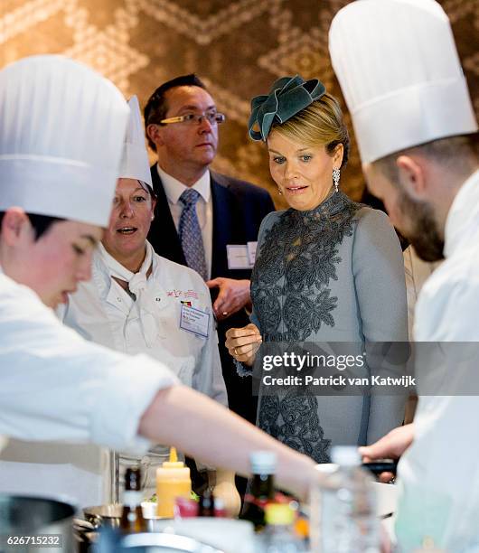 Queen Mathilde of Belgium visits the Sligro Foodgroup Netherlands on November 30, 2016 in Veghel, Netherlands.
