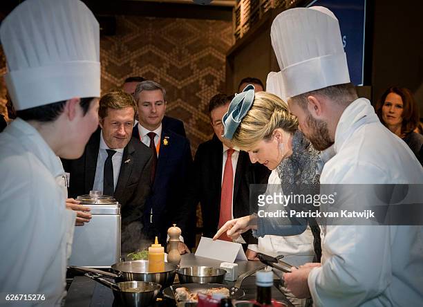 Queen Mathilde of Belgium visits the Sligro Foodgroup Netherlands on November 30, 2016 in Veghel, Netherlands.