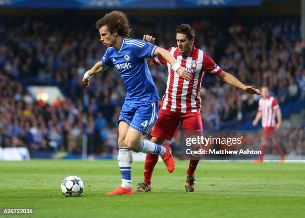 David Luiz of Chelsea and Koke of Atletico Madrid