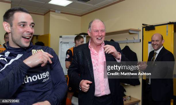 Steve Morgan the owner / chairman of Wolverhampton Wanderers celebrates winning the league One title