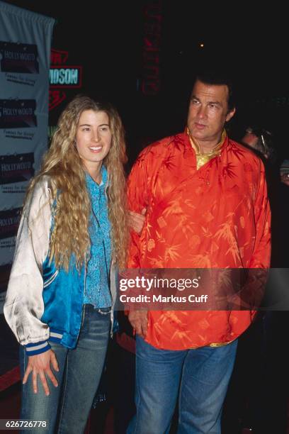 Arissa Wolf and Steven Seagal arrives at the Hard Rock Cafe at CityWalk at Universal Studios Hollywood for a Charity Jam.