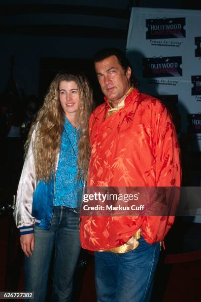 Steven Seagal and wife Adrienne La Russa arrives at the Hard Rock Cafe at CityWalk at Universal Studios Hollywood for a Charity Jam.