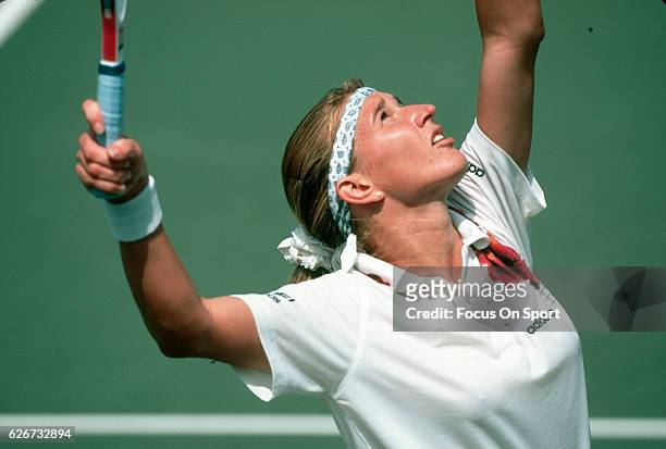 Tennis player Steffi Graf of Germany serves during the women 1995 U.S. Open Tennis Tournament circa 1995 at the USTA National Tennis Center in the...