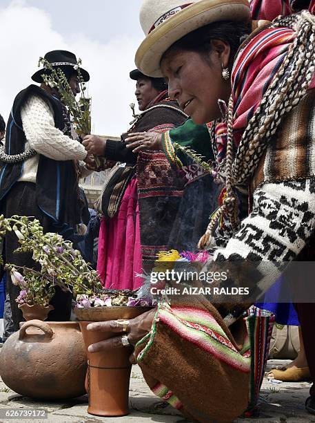 Group of "amautas" -masters in Quechua language- take part in the ritual of Jallupacha , to ask for rains, on November 30, 2016 in El Alto, Bolivia....