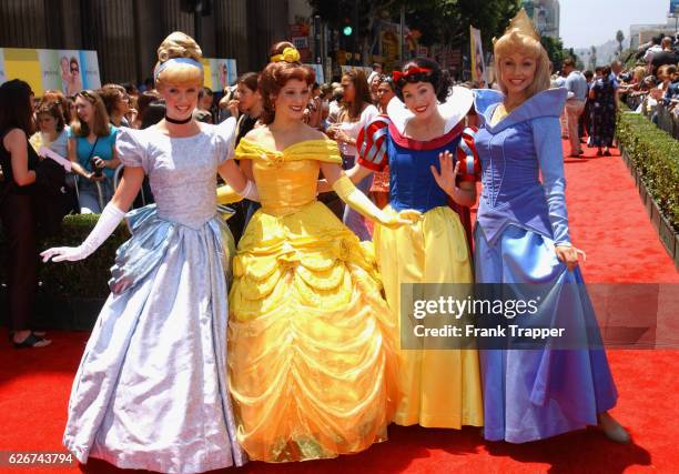 Walt Disney characters Cinderella, Belle, Snow White and Sleeping Beauty perform at the premiere of "The Princess Diaries."
