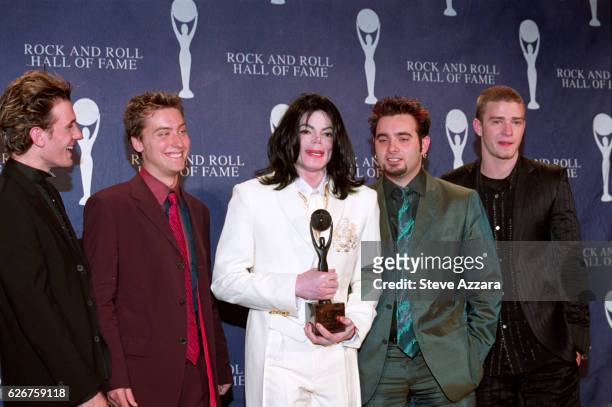 Michael Jackson poses with : JC Chasez, Lance Bass, Chris Kirkpatrick, and Justin Timberlake of *NSync at the 16th Annual Rock & Roll Hall of Fame...