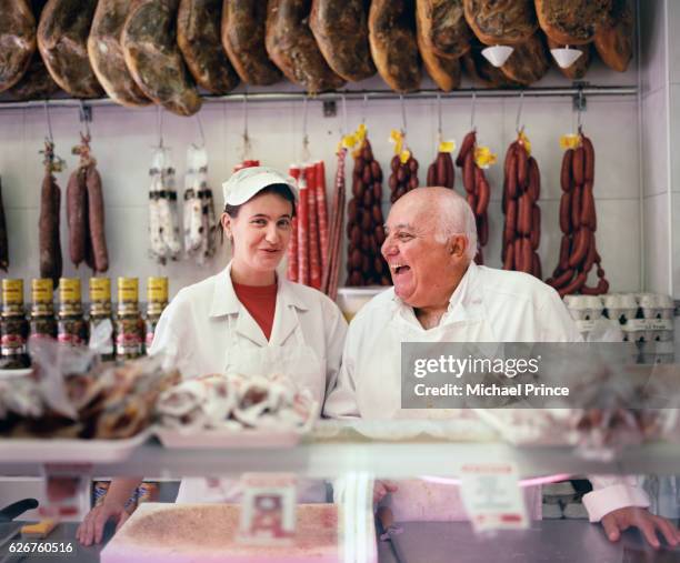 family butcher business - macellaio foto e immagini stock