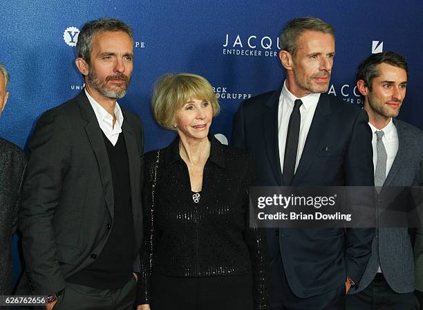 Lambert Wilson, Jan Cousteau, and Jerome Salle on the red carpet on arrival for the opening film of the 16th French Film Week Berlin, 'L'Odyssee' ,...