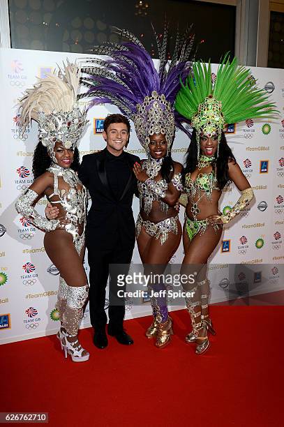 Host and diver Tom Daley poses with Rio carnaval dancers as he attends the Team GB Ball at Battersea Evolution on November 30, 2016 in London,...