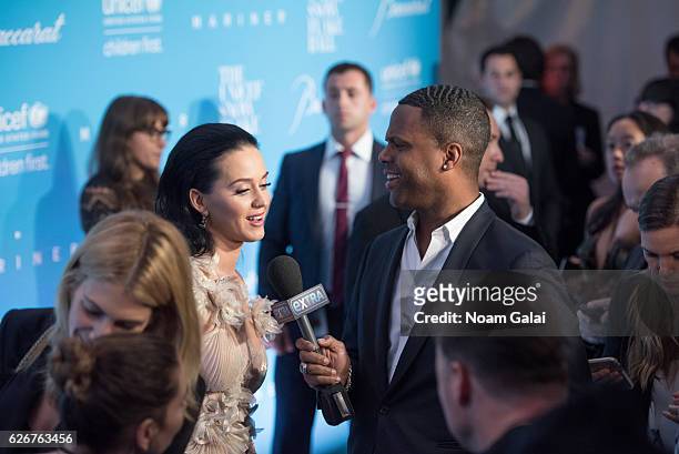 Singer Katy Perry and TV Host A. J. Calloway attend the 12th Annual UNICEF Snowflake Ball at Cipriani Wall Street on November 29, 2016 in New York...