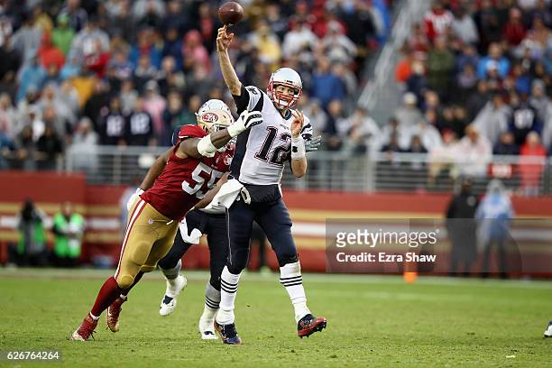 Tom Brady of the New England Patriots is pressured by Ahmad Brooks of the San Francisco 49ers at Levi's Stadium on November 20, 2016 in Santa Clara,...