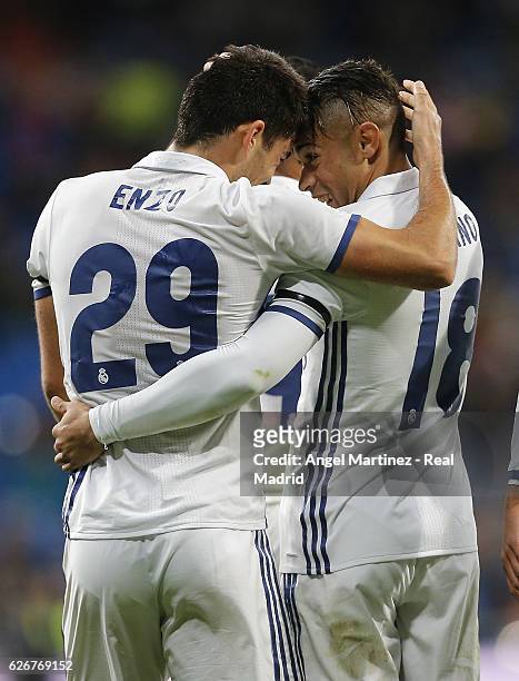 Enzo Zidane of Real Madrid celebrates with Mariano Diaz after scoring their team's fourth goal during the Copa del Rey round of 32 second leg match...