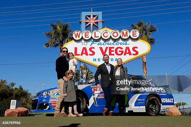 Sprint Cup Series champion Jimmie Johnson along with his daughters Genevieve Marie and Lydia Norriss, Crew Cheif Chad Knaus and Brooke Werner pose...
