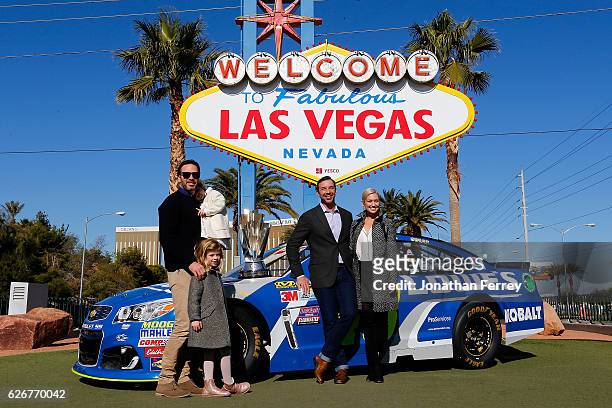Sprint Cup Series champion Jimmie Johnson along with his daughters Genevieve Marie and Lydia Norriss, Crew Cheif Chad Knaus and Brooke Werner pose...