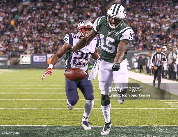 New York Jets Wide Receiver Brandon Marshall comes up just short of reeling in a pass to the the end zone during the 2nd Half of an NFL football game...