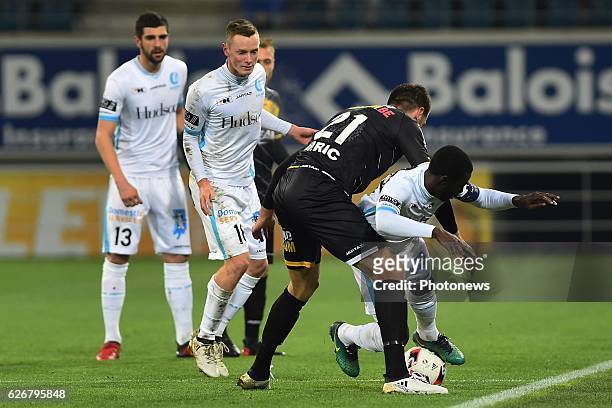 Rob Schoofs midfielder of KAA Gent, Nana Asare defender of KAA Gent and Marko Miric of sporting lokeren in a fight for the ball during the Croky Cup...
