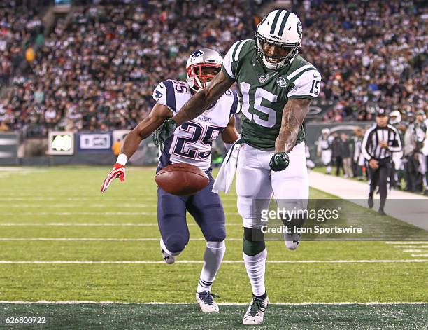 New York Jets Wide Receiver Brandon Marshall comes up just short of reeling in a pass to the the end zone during the 2nd Half of an NFL football game...