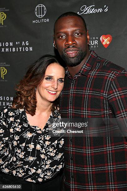 French actor, Omar Sy and his wife Helene attend a cocktail party to benefit CeKeDuBonheur at Piscine Molitor on November 30, 2016 in Paris, France.