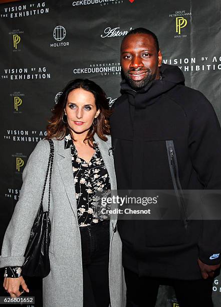 French actor, Omar Sy and his wife Helene attend a cocktail party to benefit CeKeDuBonheur at Piscine Molitor on November 30, 2016 in Paris, France.